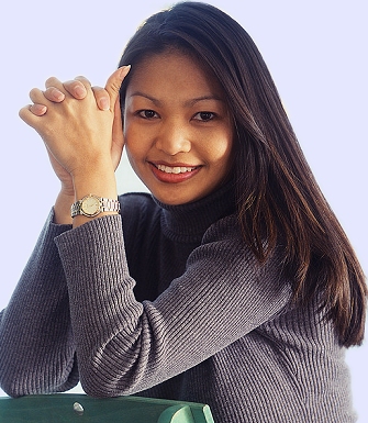 a woman smiling and showing her crowns